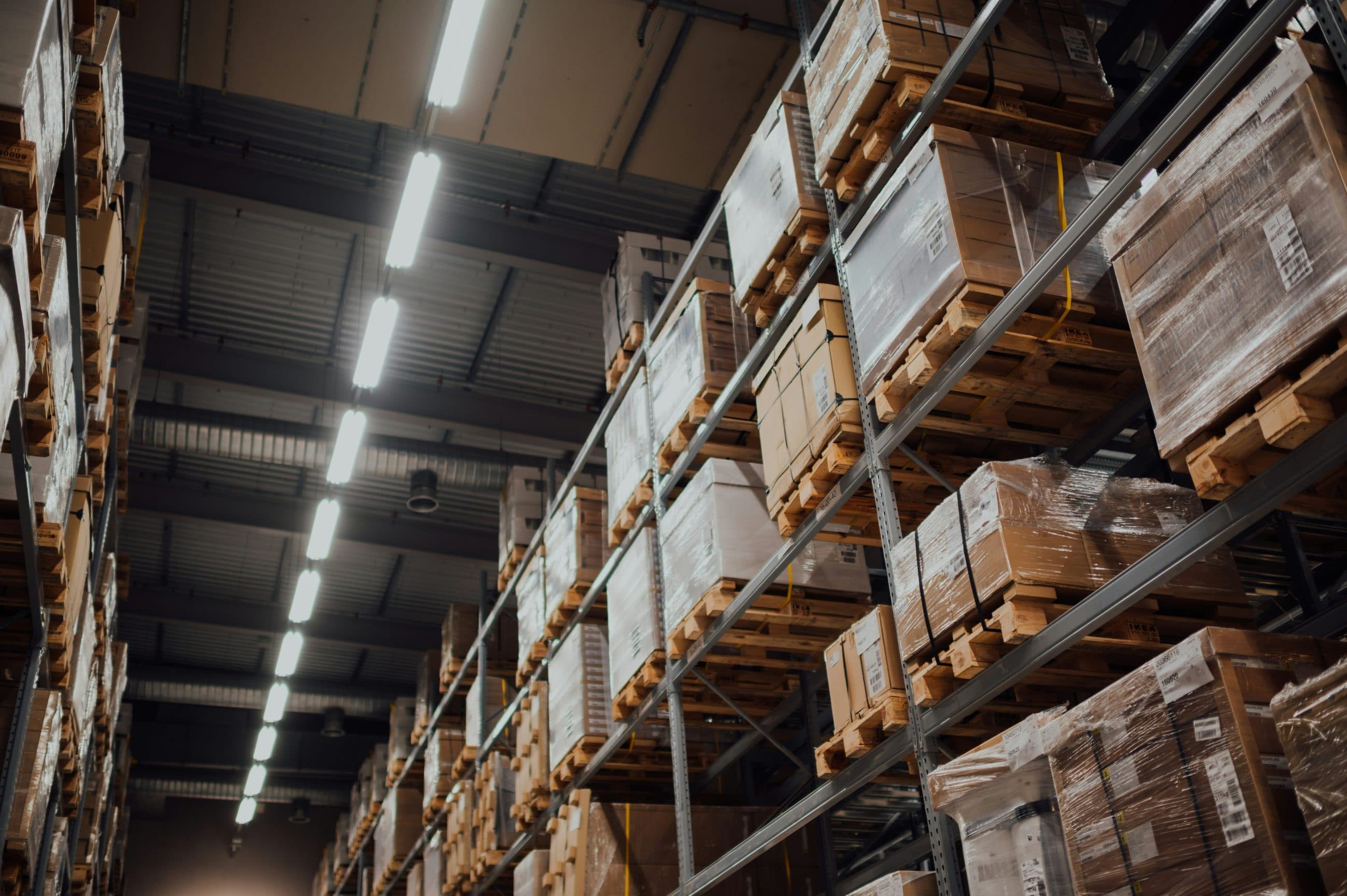 Industrial warehouse racking stocked with palletised materials