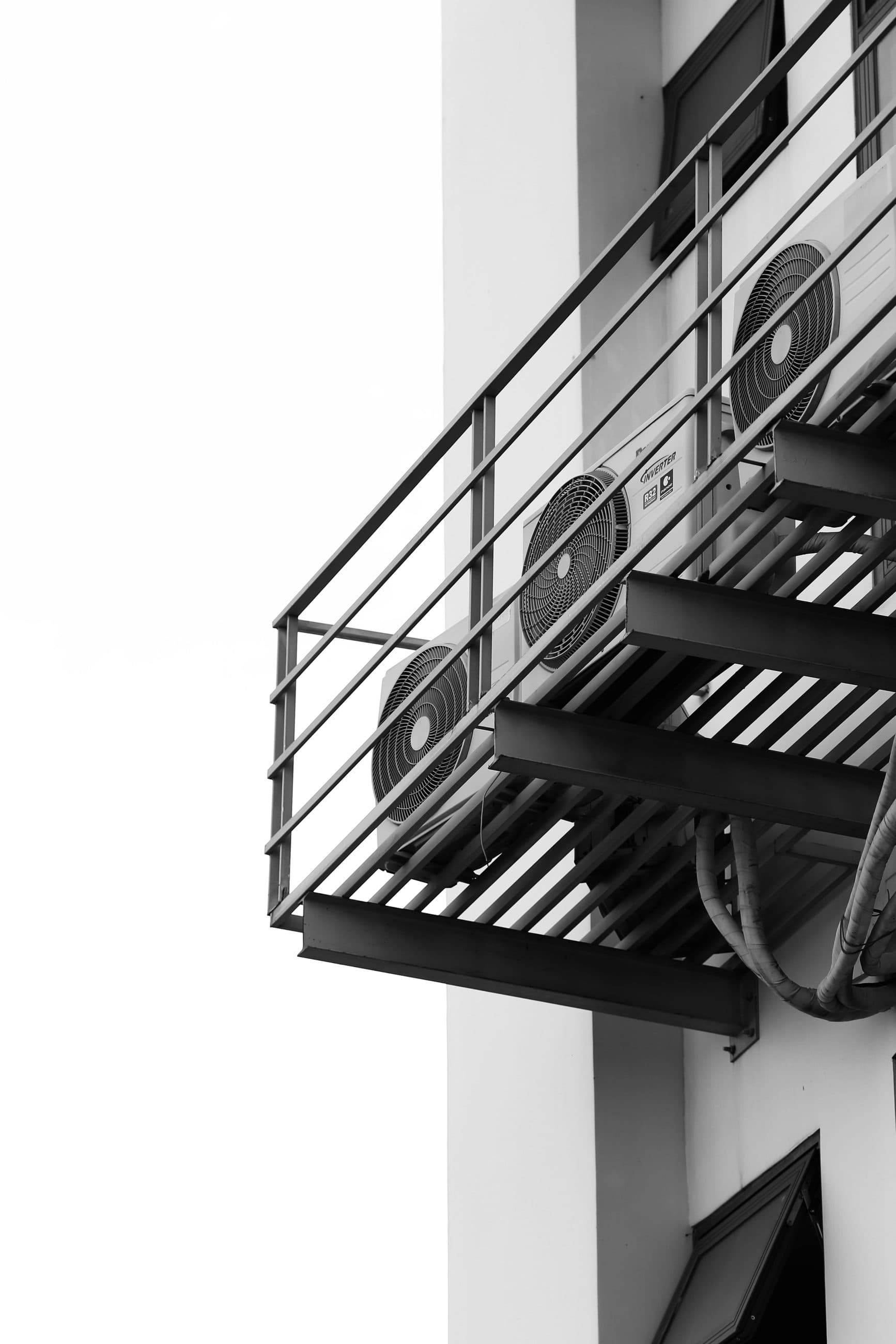 External condenser units mounted to a building facade