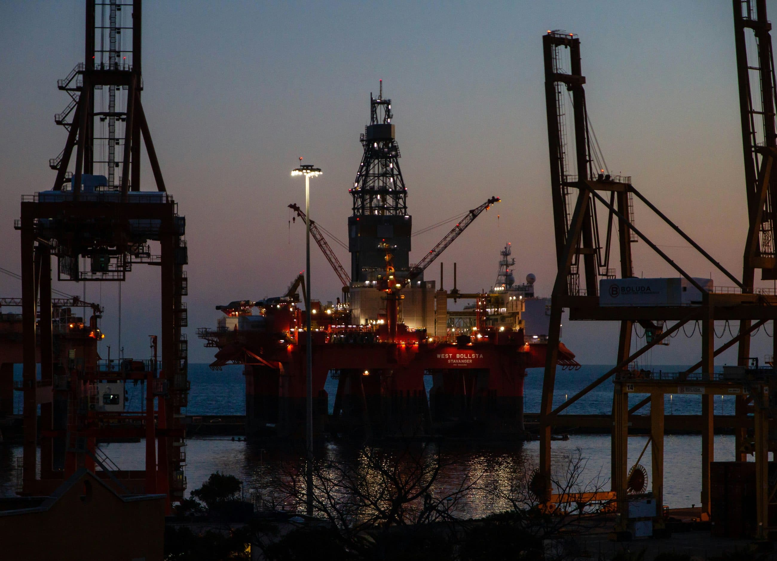 Offshore platform and port infrastructure at dusk